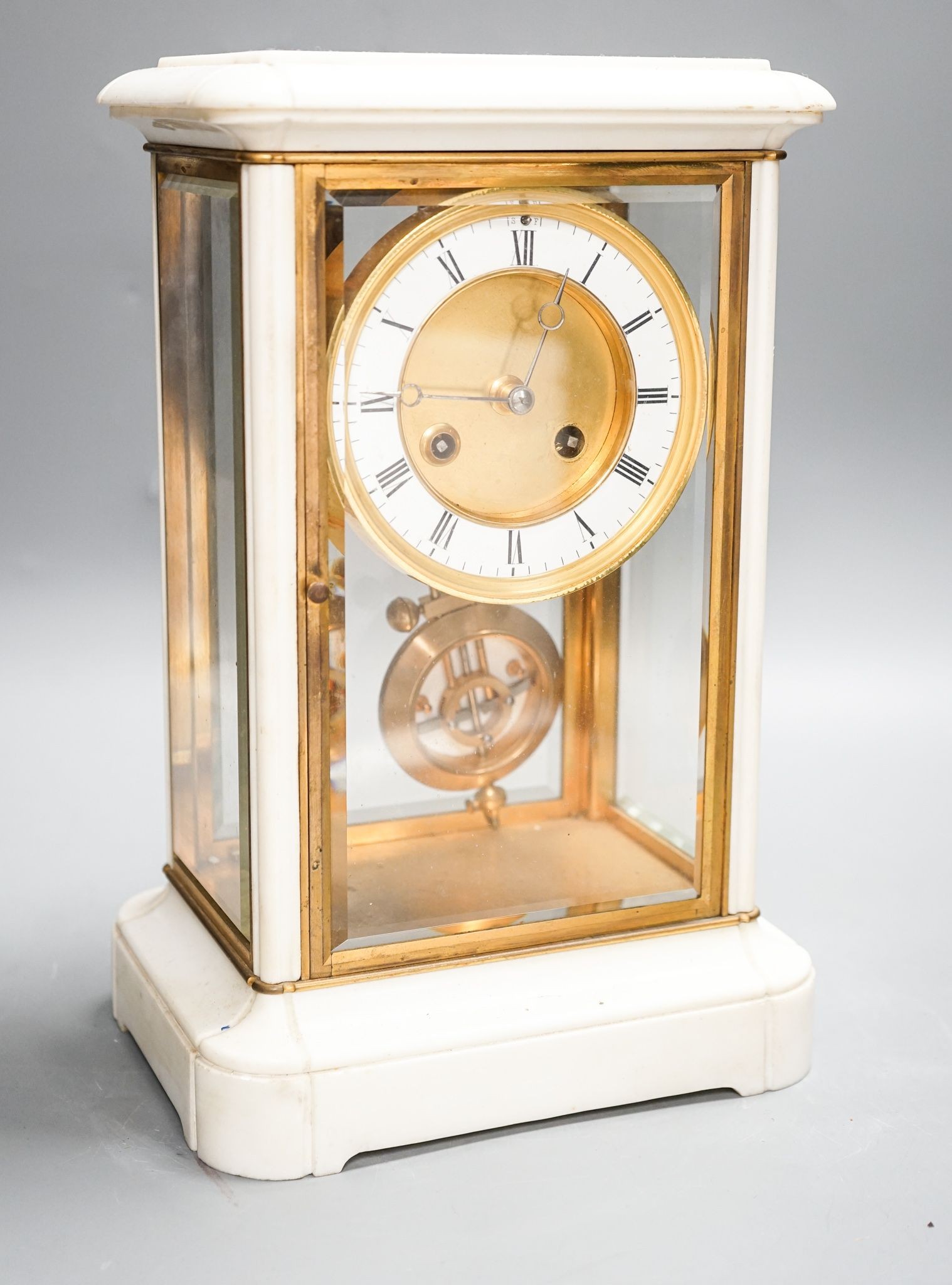 An unusual French white marble and brass cased four glass mantel clock, late 19th century, bi-metallic pendulum, no key. 32cm
